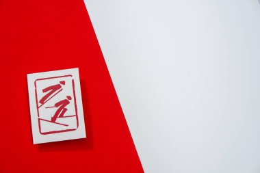 Nordic combined pictogram ve kırmızı arkaplan. Kış oyunu için spor duvar kağıdı