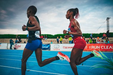 SAMORIN, SLOVAKIA, 9. JULY: Women's long-distance athletics race. Track and Field. Female runners from Africa, from Kenya and Ethiopia are running on the blue track. Prepare for World Championships.