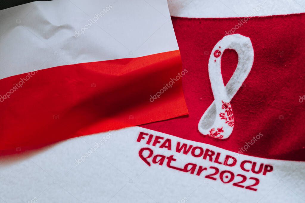 QATAR, DOHA, 18 JULY, 2022: Poland National flag and logo of FIFA World Cup in Qatar 2022 on red carpet. Soccer sport background, edit space. Qatar 22 Wallpaper. National symbol, football event