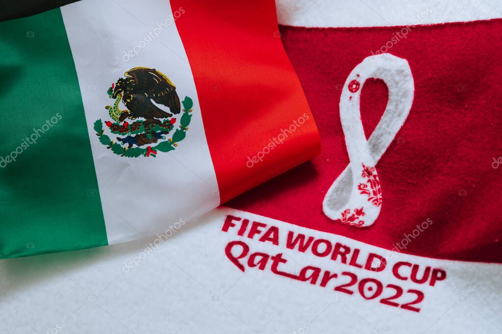 QATAR, DOHA, 18 JULY, 2022: Mexico National flag and logo of FIFA World Cup in Qatar 2022 on red carpet. Soccer sport background, edit space. Qatar 22 Wallpaper. National symbol, football event