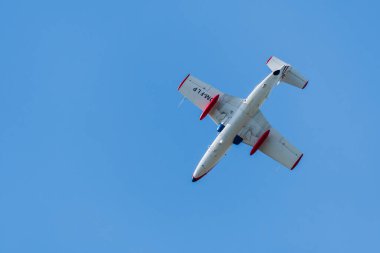 Leszno, Poland - June, 17, 2022: Antidotum Airshow Leszno, Aero L-29 Delfin, Czechoslovak military jet aircraft. The pilot performs acrobatics in the air demonstrating his skills.