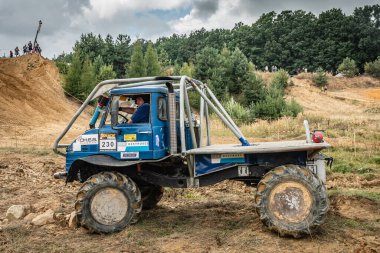Kunstat, Czech Republic - August 14, 2022: Unidentified truck at difficult muddy terrain during truck trial National championship show of Czech Republic 2022  in Kunstat.