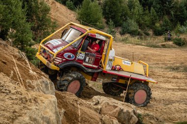 Kunstat, Czech Republic - August 14, 2022: Unidentified truck at difficult muddy terrain during truck trial National championship show of Czech Republic 2022  in Kunstat.