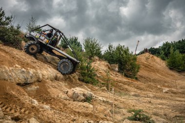 Kunstat, Czech Republic - August 14, 2022: Unidentified truck at difficult muddy terrain during truck trial National championship show of Czech Republic 2022  in Kunstat.