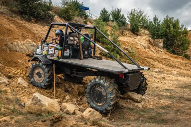 Kunstat, Czech Republic - August 14, 2022: Unidentified truck at difficult muddy terrain during truck trial National championship show of Czech Republic 2022  in Kunstat.
