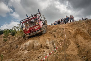 Kunstat, Czech Republic - August 14, 2022: Unidentified truck at difficult muddy terrain during truck trial National championship show of Czech Republic 2022  in Kunstat.