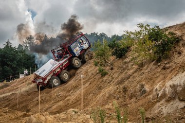 Kunstat, Czech Republic - August 14, 2022: Unidentified truck at difficult muddy terrain during truck trial National championship show of Czech Republic 2022  in Kunstat.