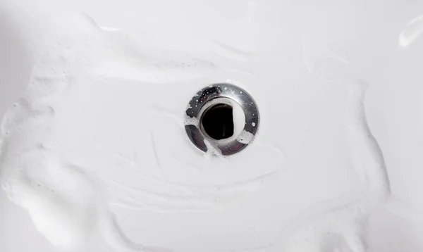 Clean domestic bath drain sink. Siphon for bath