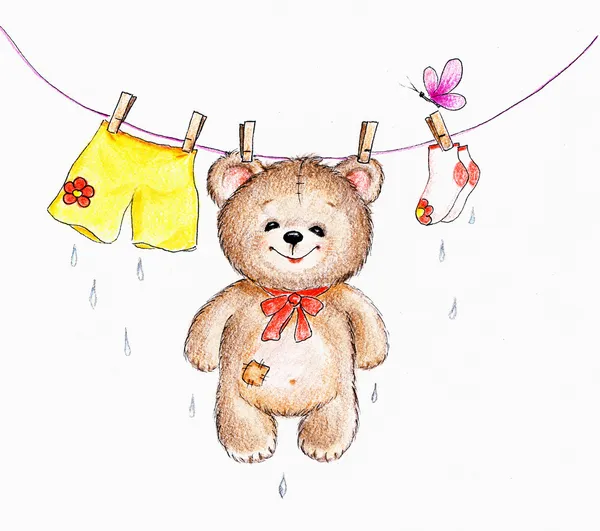 Teddy bear hanging on washing line — Stock Photo, Image