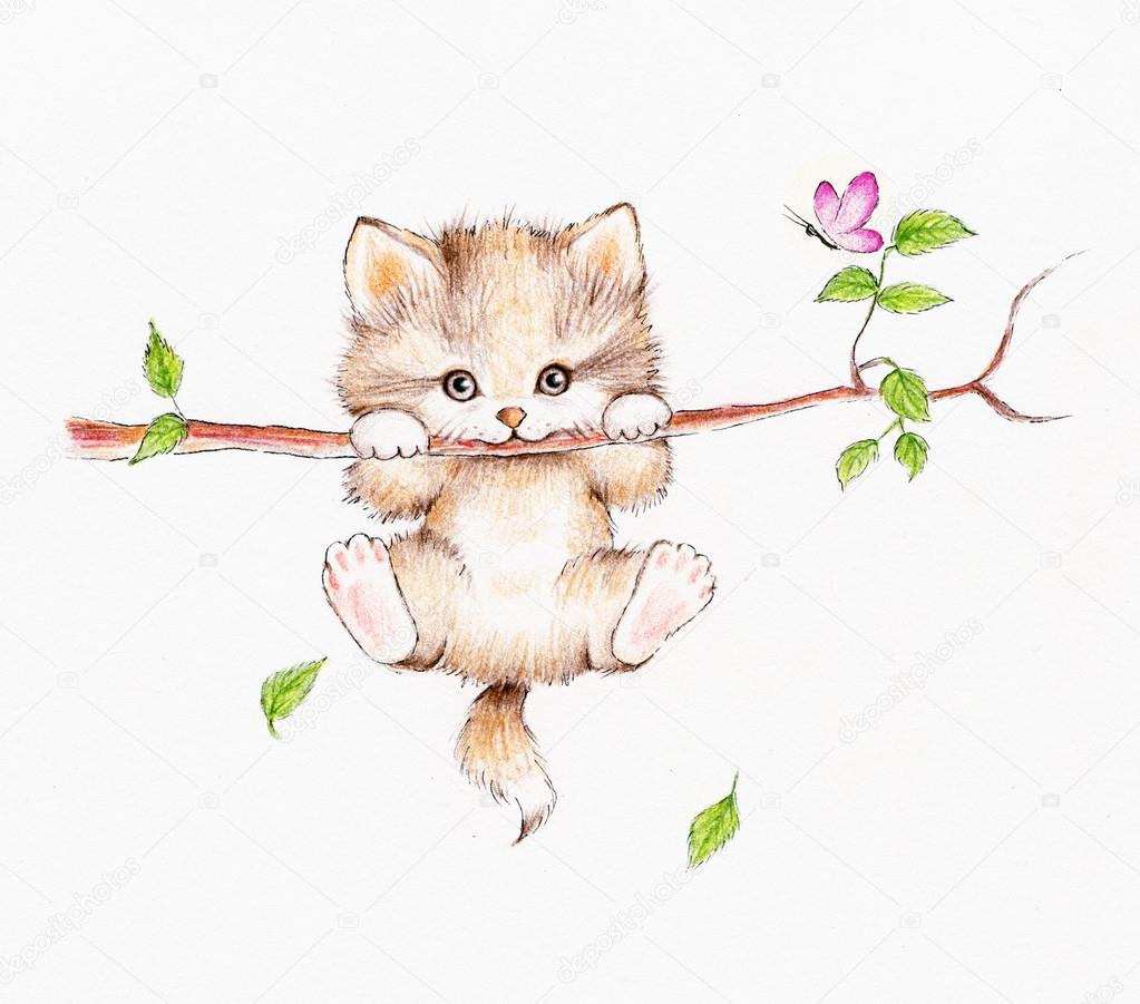 Little kitten hanging on the tree
