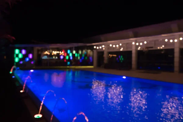Abstract Blurred Colorful Lightbulb Bokeh Swimming Pool Night Can Used — Fotografia de Stock