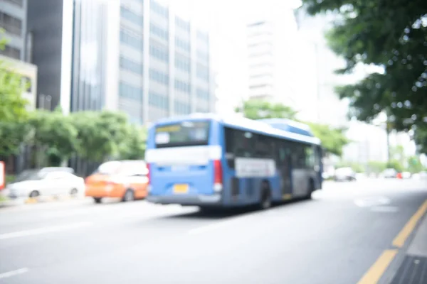 Blurred of cars, bus, traffic on the road in the city in Korea use for the background. Transportation background at day time