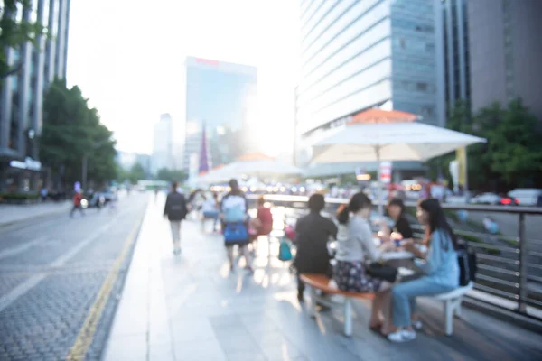 Blurred Background People Relaxed Sitting Table Sidewalk Having Street Food — Photo