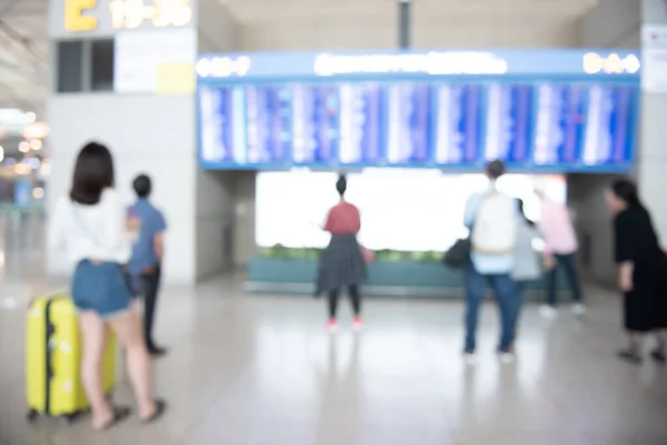 Blurred Passengers Travelers Checking Fligt Form Flight Information Board Airport — Fotografia de Stock