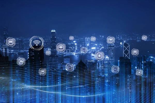 Wireless network communication, internet connection, smart city concept. Futuristic city scape in blue tone with electronics devices, multimedia, technology icons and network connection