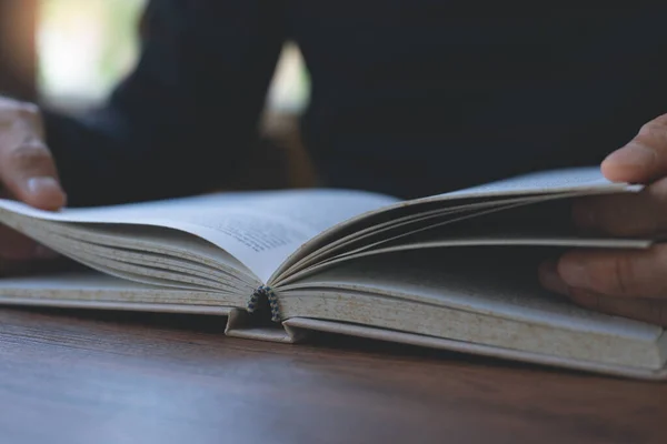 Closeup Image Student Reading Book University Library Casual Man Opening — Foto Stock