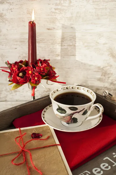 Valentine greeting card and cup on wooden tray — Stock Photo, Image