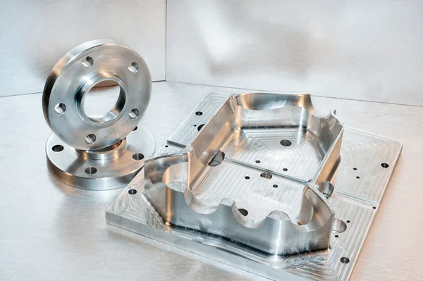 Metal mold and steel flanges. Milling industry. CNC technology. — Stock Photo, Image