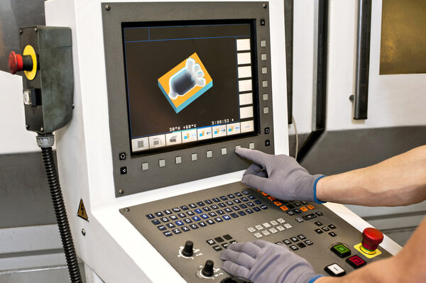 Buttons on computer numerical control programmable machine