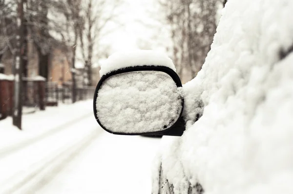 Car mirror covered of snow. Outside — Stock Photo, Image