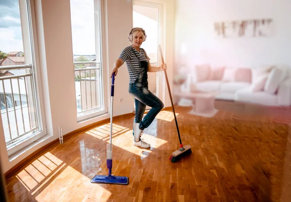 Happy Woman Dancing Singing Headset Cleaning New Home Copy Space — Stock Photo, Image