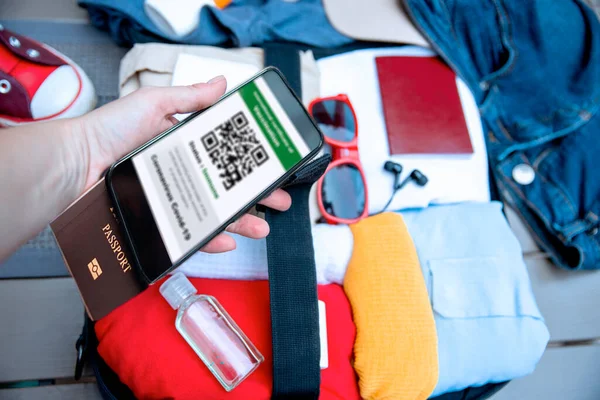 Packing Trip Covid Pandemic Preparing Suitcase Digital Nhs Vaccination Certificate —  Fotos de Stock