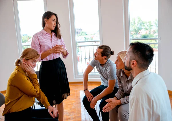 People have conversation on Support group talking about life. Diverse Millennial employees with new ideas on casual meeting