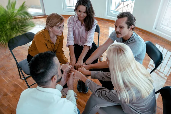 People have conversation on Support group talking about life. Diverse Millennial employees with new ideas on casual meeting