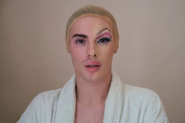 Half man half woman make up person. Drag queen person with and without make up.