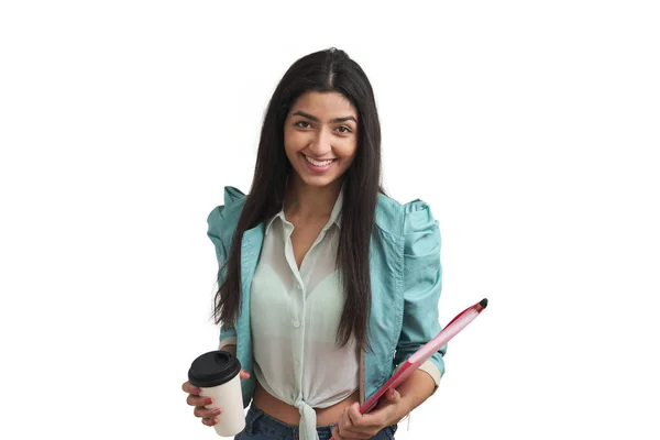 Young Venezuelan woman smiling with coffee and folder, isolated. — Stockfoto