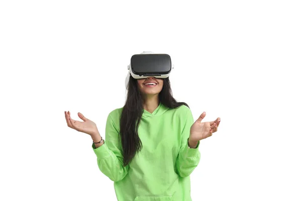 Happy Venezuelan woman using a VR headset, isolated. — Stock fotografie