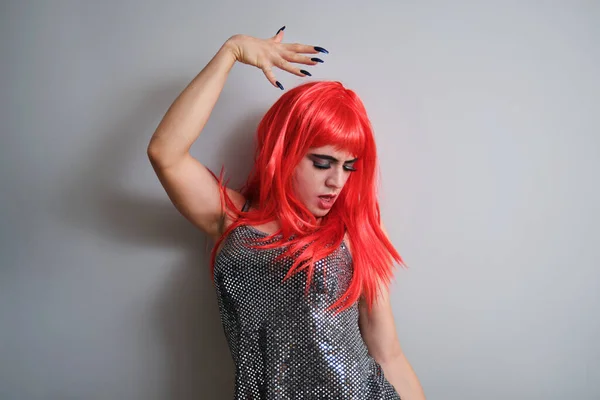 Portrait Gender Fluid Male Wearing Red Wig Dancing Grey Background — Stockfoto