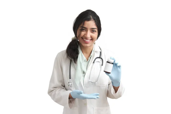 Young Venezuelan Female Doctor Smiling Pointing Pill Bottle Isolated White — ストック写真