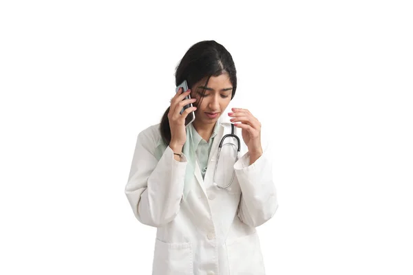 Young Venezuelan Female Doctor Sad Talking Smartphone Isolated White Background — Stock Photo, Image