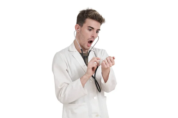 Young Caucasian Male Doctor Listen His Pulse Stethoscope Isolated White — Zdjęcie stockowe