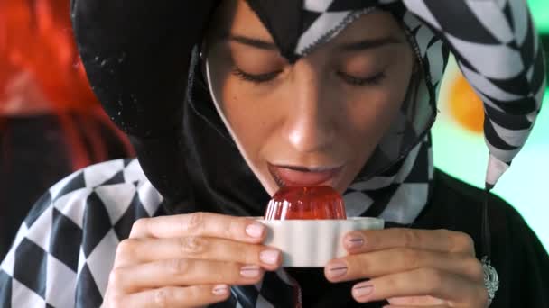 Woman Dressed Harlequin Eating Red Jelly Spitting Out Laughing Halloween — Video Stock