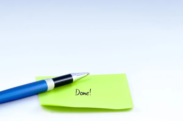 Blue pen and done note — Stock Photo, Image