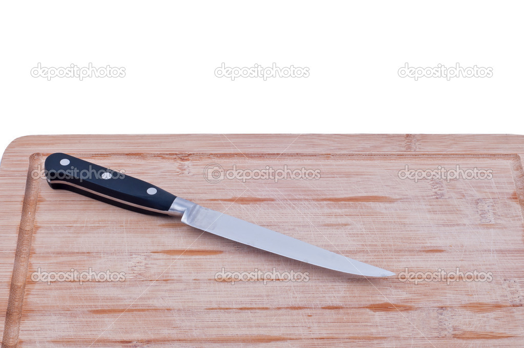 chopping board with a knife closeup