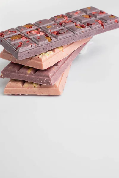Chokolate bar - raw dessert with berries on white background — Stock Photo, Image