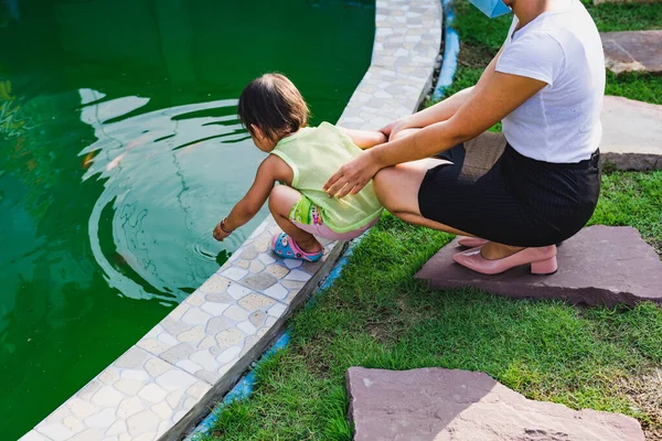 Mother Son Watching Koi Fish Pond Garden House Concept Relaxing — Stock Photo, Image