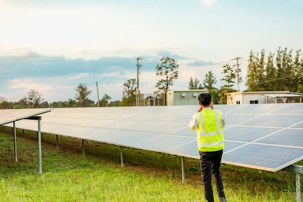 Operate and maintain solar power plants Engineers inspect and maintain solar power plants. solar power plant Green energy innovation for life.