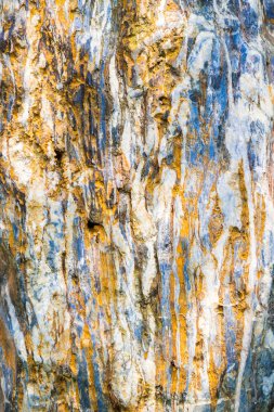 stone wall yellow background