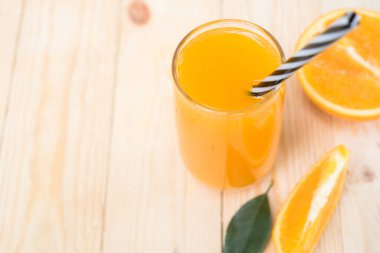 fresh orange juice with orange fruit outdoor table