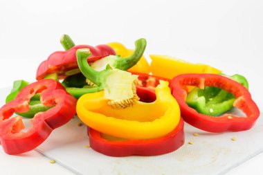 Sliced sweet pepper, bell pepper on white background