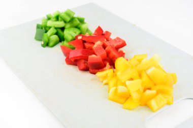Sliced sweet pepper, bell pepper on white background