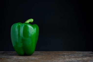 Sweet pepper, bell pepper on black background