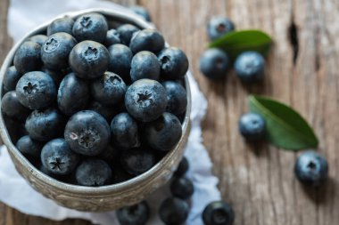 Fresh blueberries on cup
