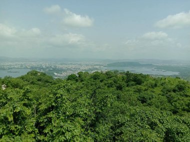 peak view of  aravali mountains and blue sky in udaipur in rajasthan 