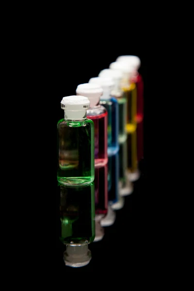 Aromaterapie barevná láhev olej — Stock fotografie