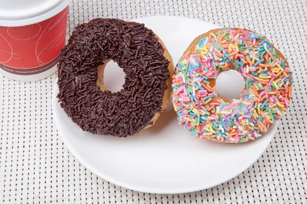 Colorful and chocolate Donut with coffee — Stock Photo, Image